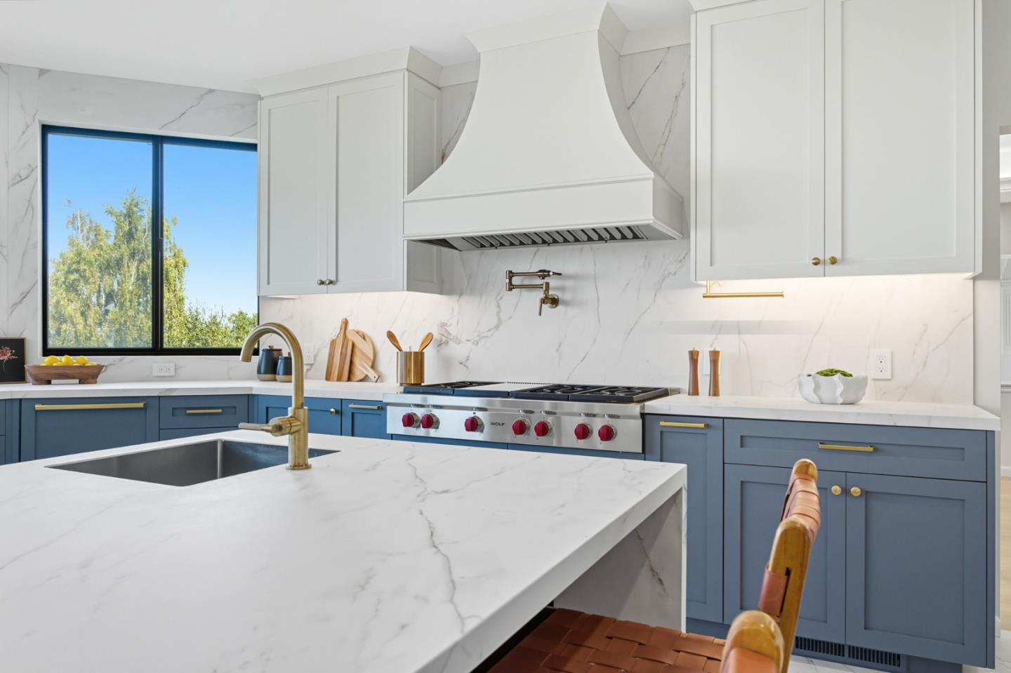 1 Lewis Ranch Road San Carlos, CA 94070 - Photo 9 of 111 a kitchen with a stove a sink and a refrigerator