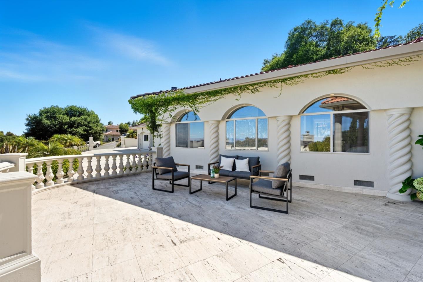 1 Lewis Ranch Road San Carlos, CA 94070 - Photo 96 of 111 a view of a house with wooden deck and furniture