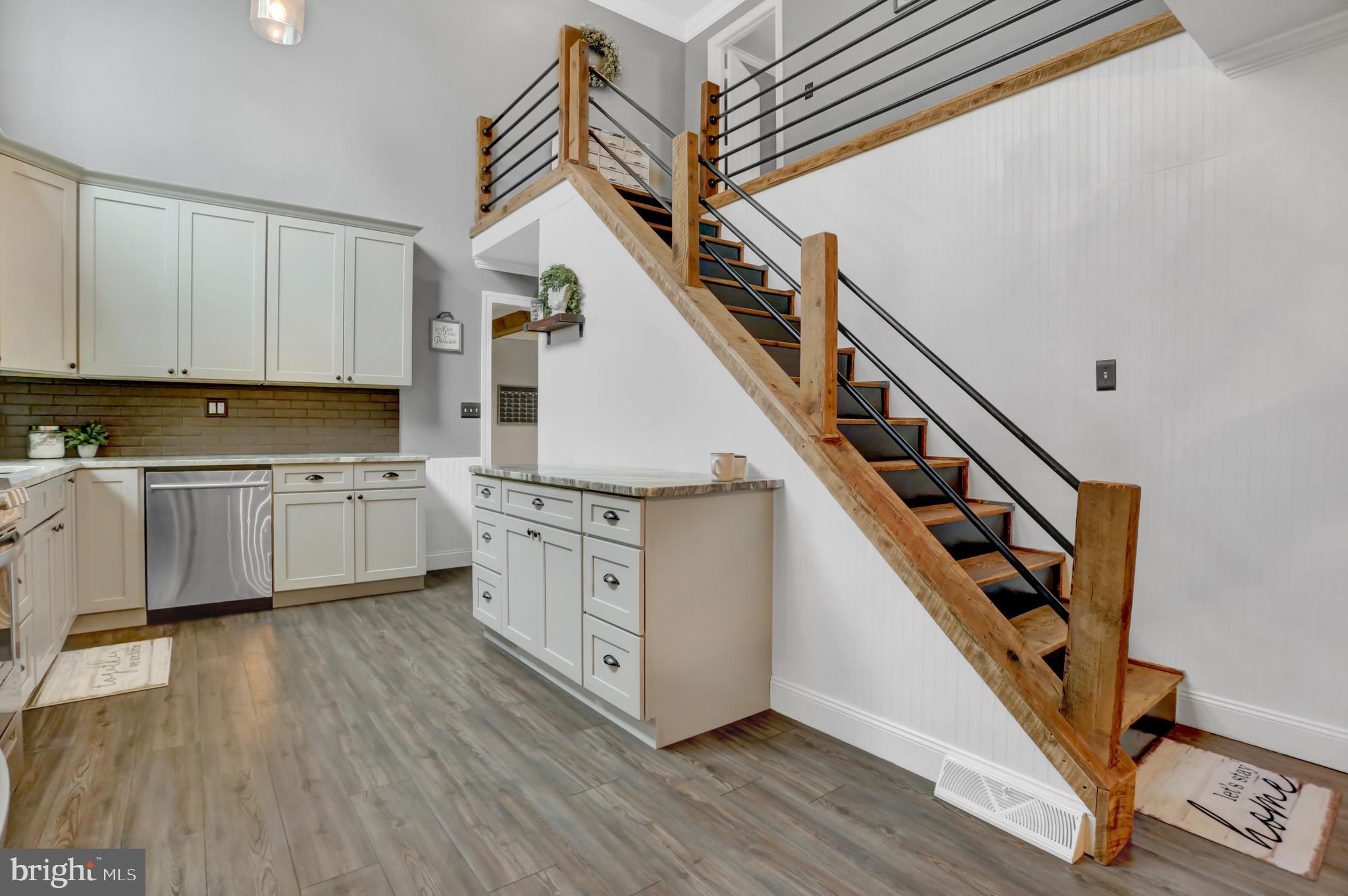 286 Hess Road Quarryville, PA 17566 - Photo 22 of 60 Wood Staircase Leading to the Upper Level
