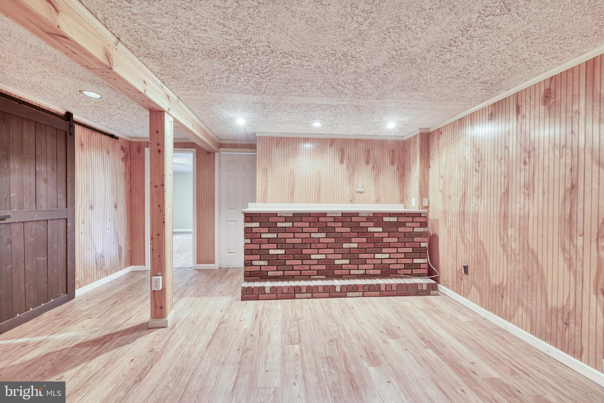 3500 East Lawndale Road Reisterstown, MD 21136 - Photo 24 of 31 a view of an empty room with wooden floor and a window