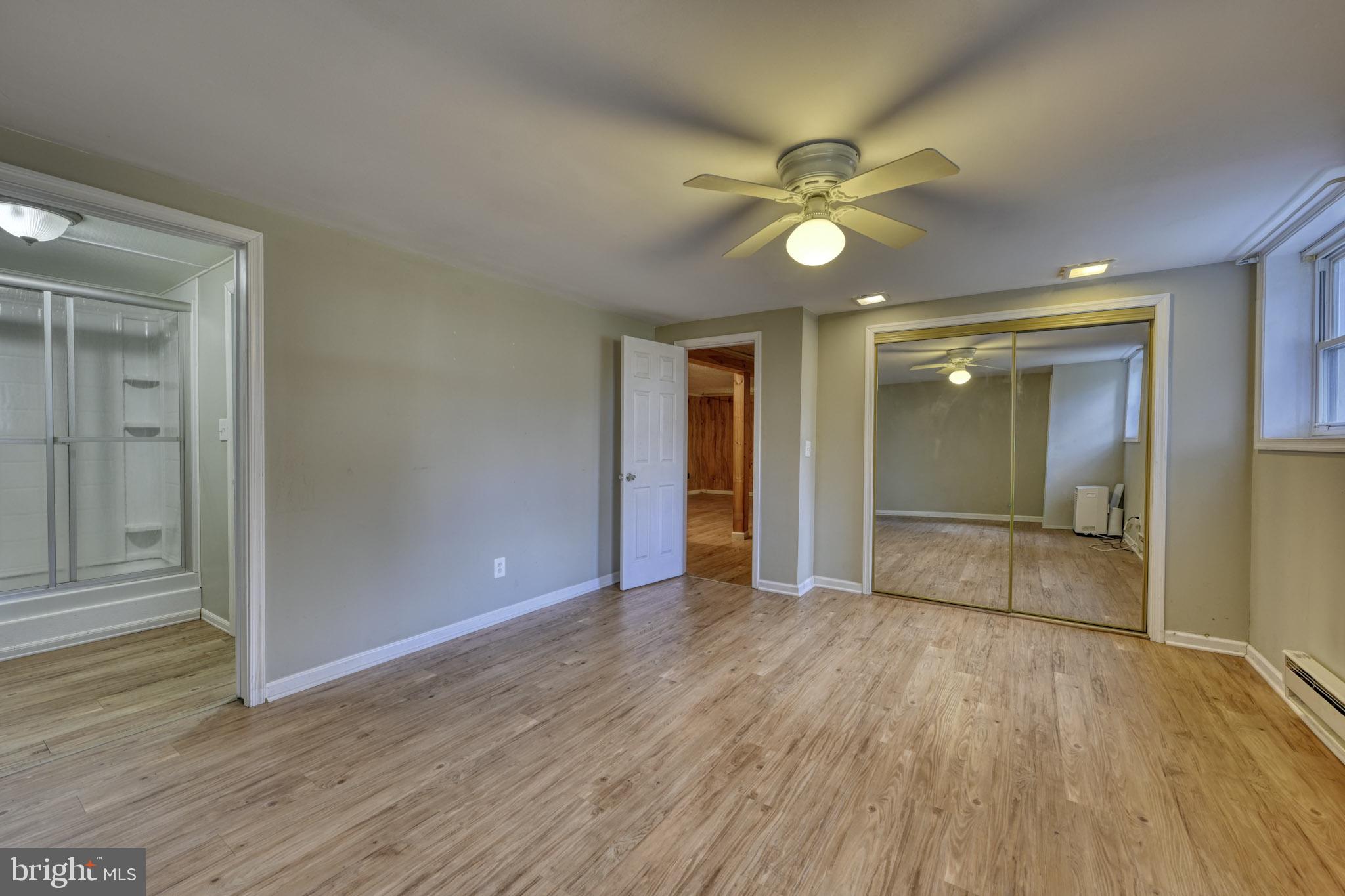3500 East Lawndale Road Reisterstown, MD 21136 - Photo 26 of 31 a view of an empty room with wooden floor