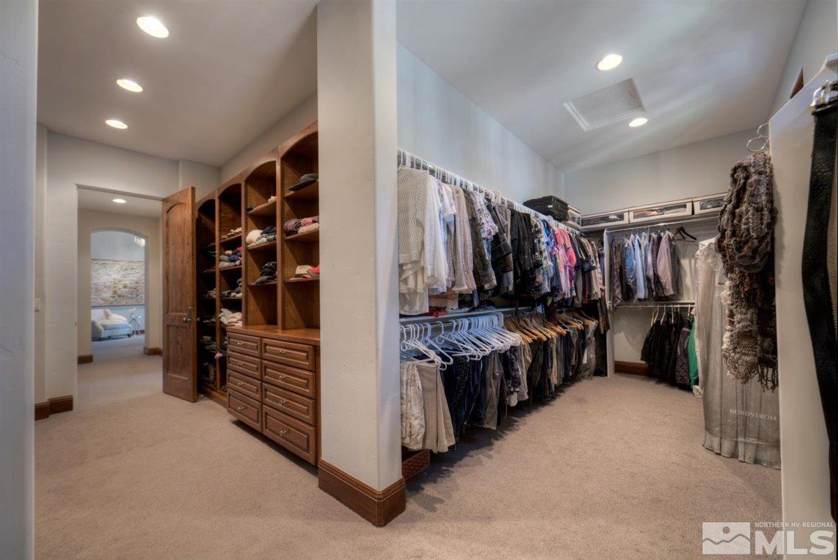 6090 Lake Geneva Drive Reno, NV 89511 - Photo 19 of 40 a view of walk in closet with clothes