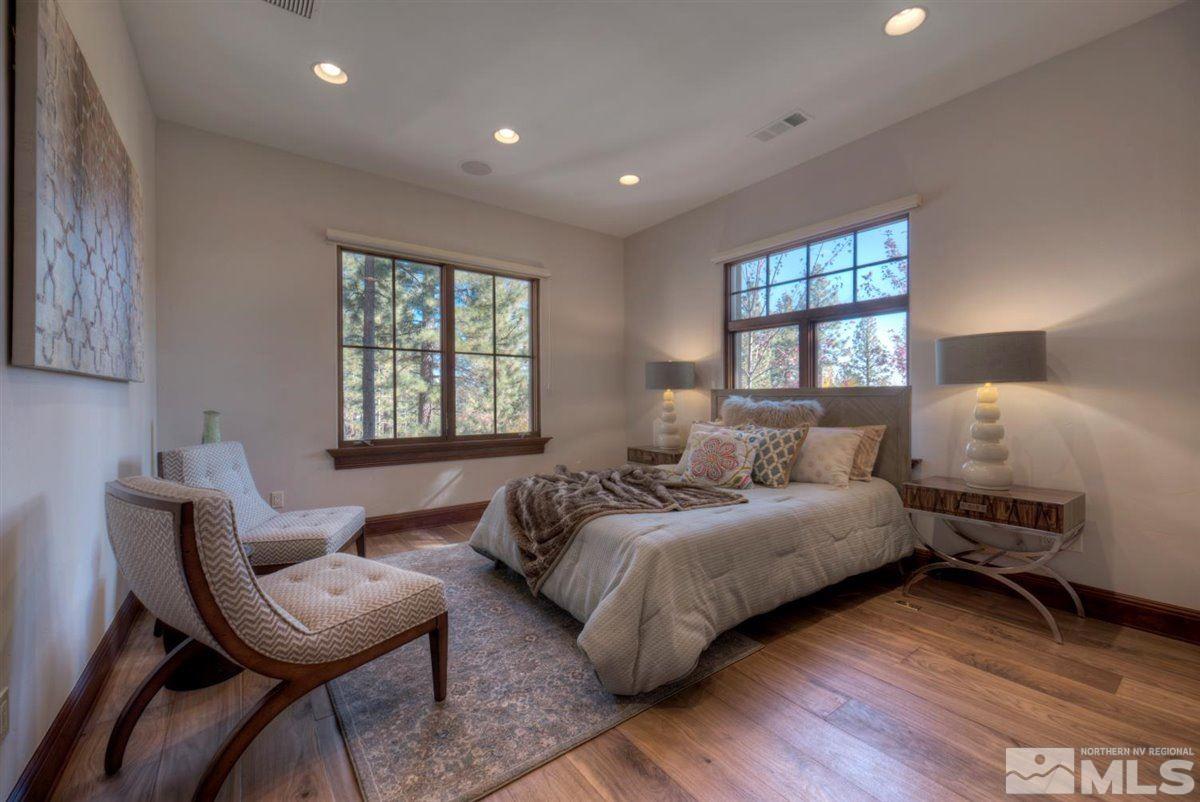 6090 Lake Geneva Drive Reno, NV 89511 - Photo 20 of 40 a bedroom with a bed window and couch