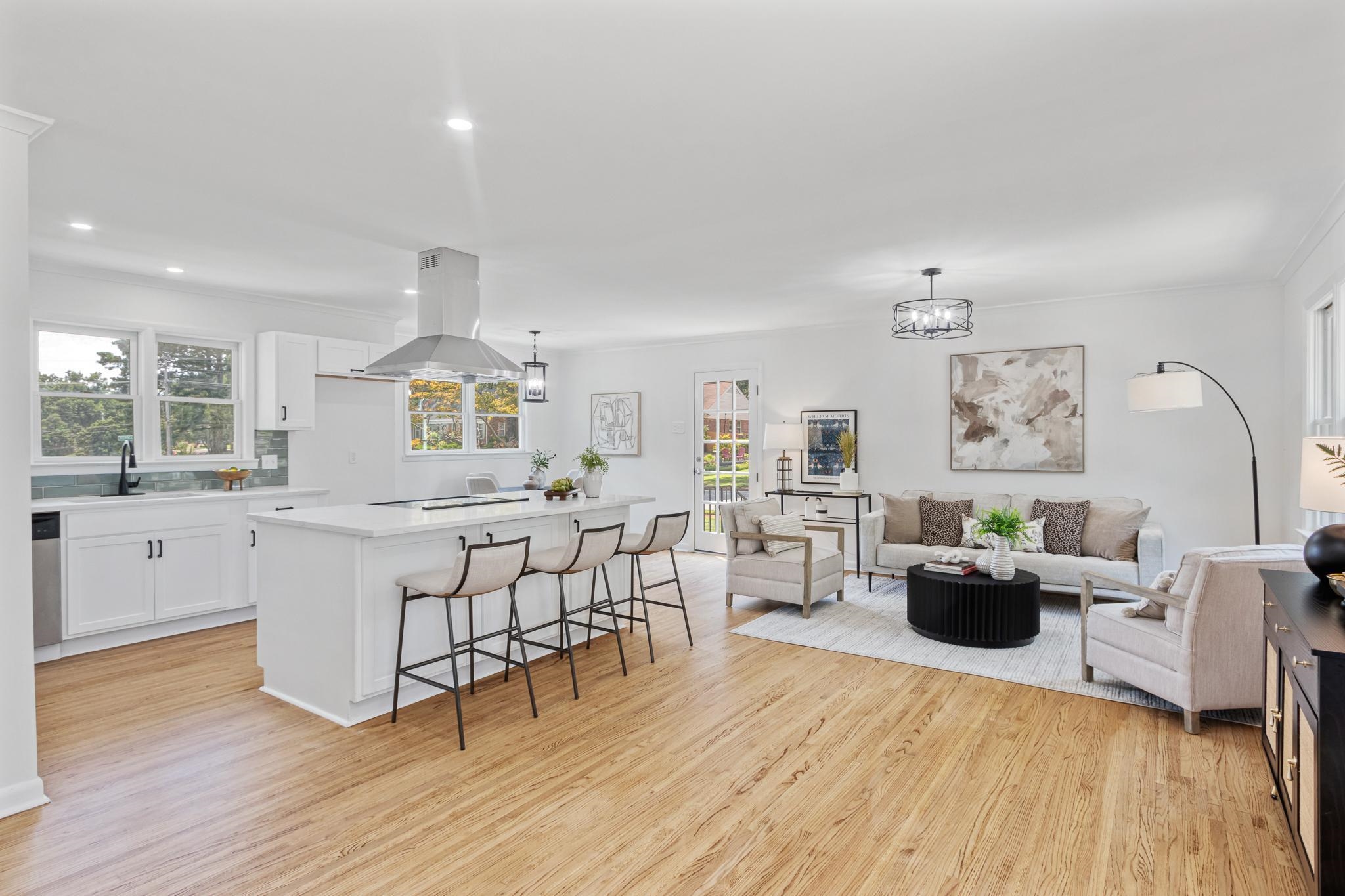 Modern Paint Palette, refinished hardwoods, designer lighting, and energy-efficient windows create a bright, turnkey space in sought-after Sylvan Hills.”