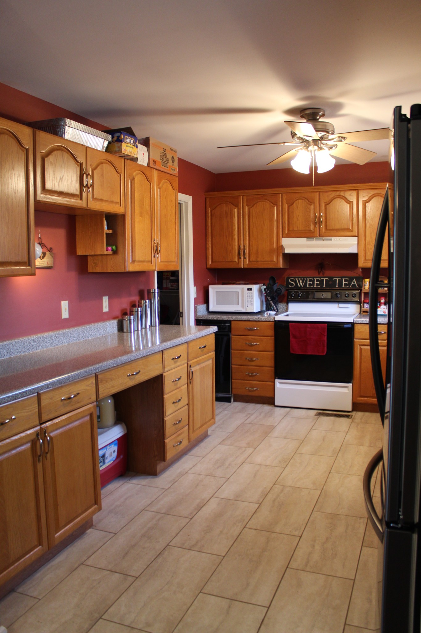 2851 Jack Teasley Road Pleasant View, TN 37146 - Photo 12 of 36 a kitchen with granite countertop a stove and cabinets