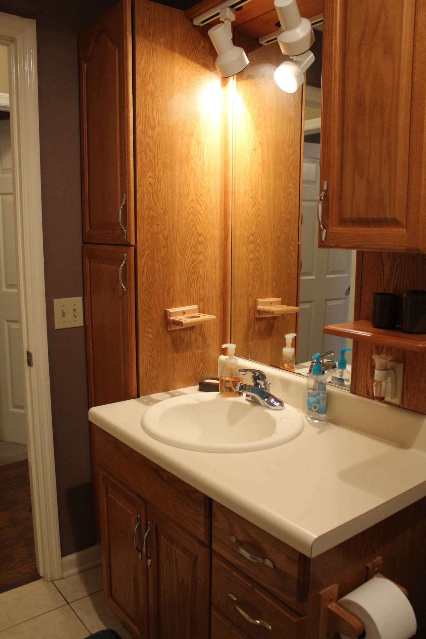 2851 Jack Teasley Road Pleasant View, TN 37146 - Photo 25 of 36 a bathroom with a sink vanity and a mirror