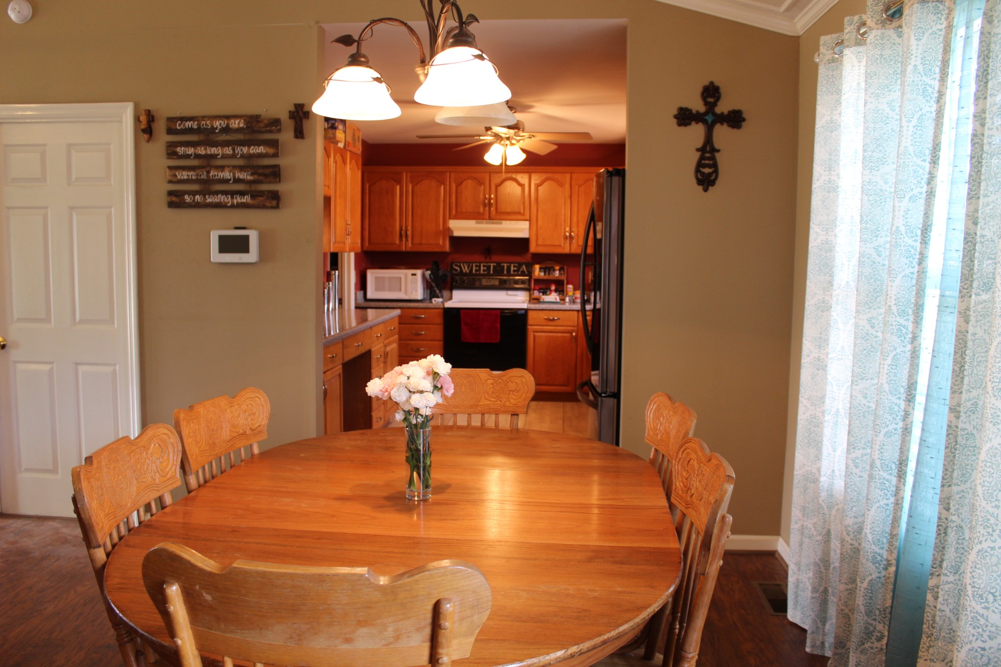 2851 Jack Teasley Road Pleasant View, TN 37146 - Photo 7 of 36 a dining room with furniture and chandelier kitchen view