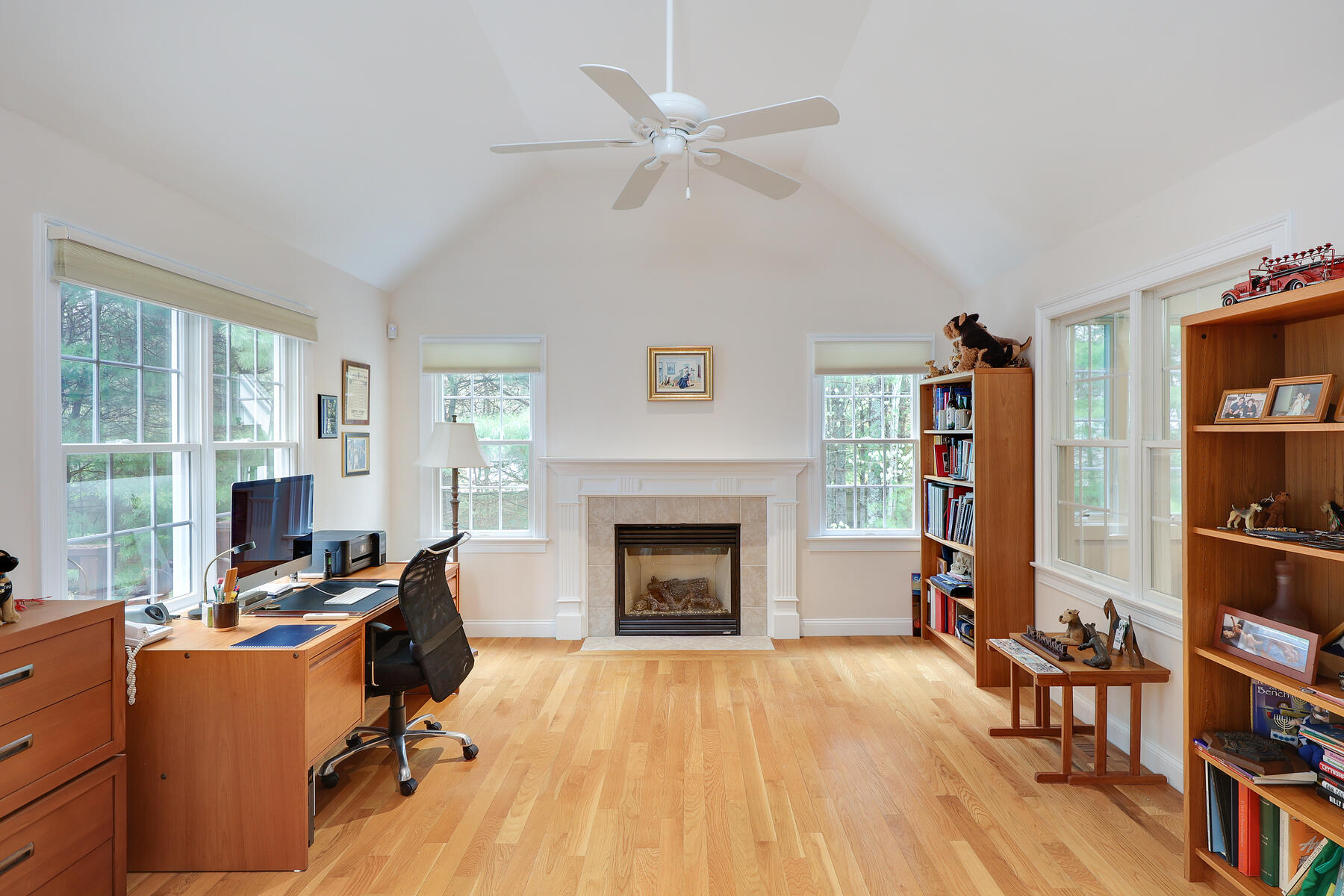 24 Sea Robin Road Osterville, MA 02655 - Photo 12 of 45 a livingroom with workspace fireplace and a window