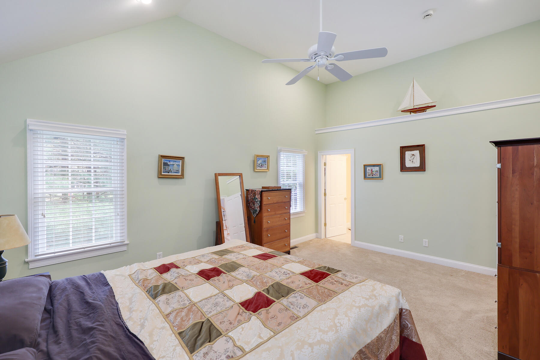 24 Sea Robin Road Osterville, MA 02655 - Photo 19 of 45 a bedroom with a bed and a window