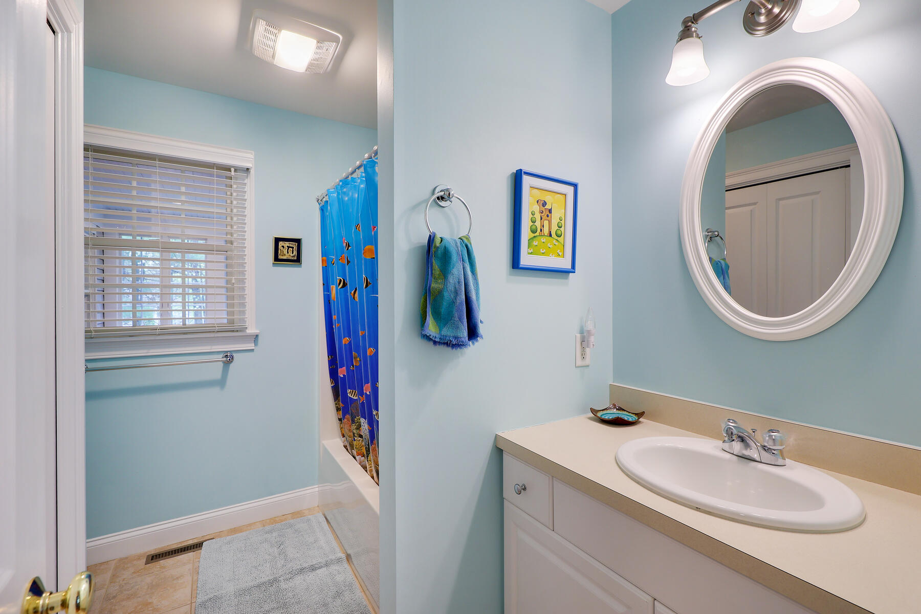 24 Sea Robin Road Osterville, MA 02655 - Photo 27 of 45 a bathroom with a sink and a mirror