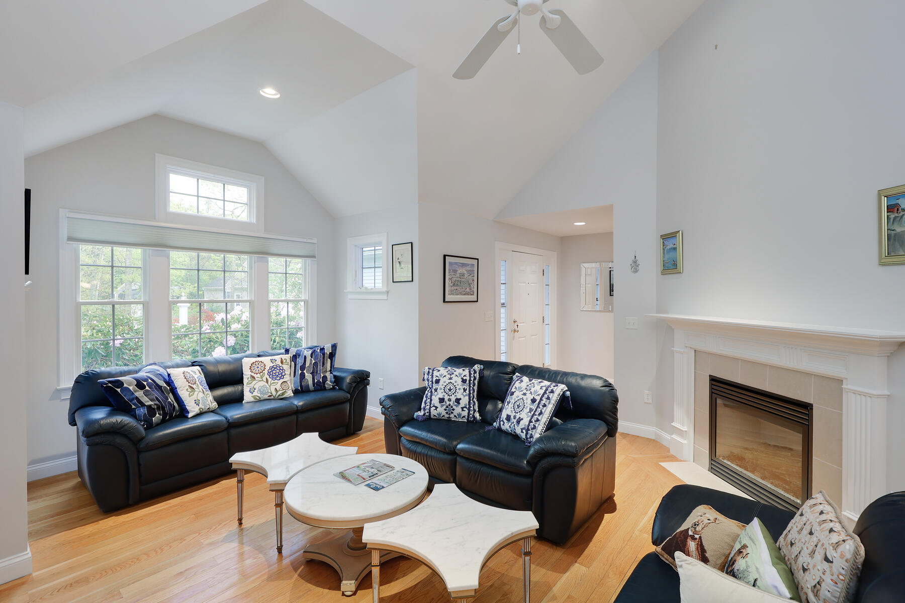 24 Sea Robin Road Osterville, MA 02655 - Photo 3 of 45 a living room with furniture and a fireplace
