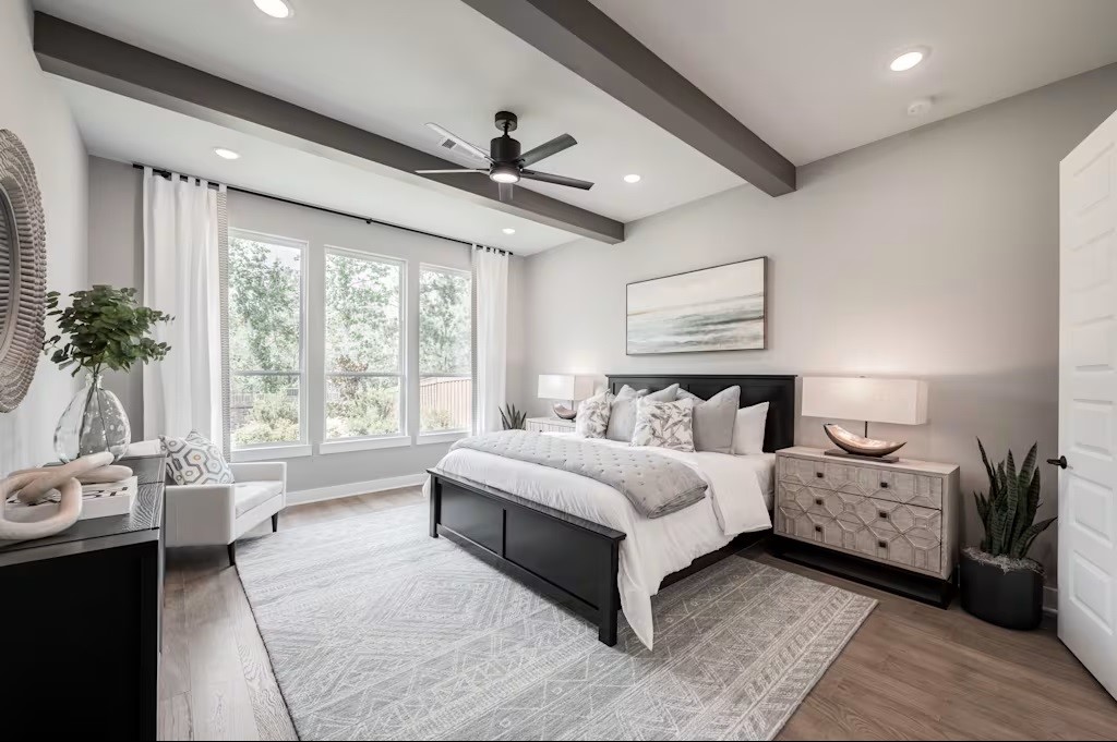 7810 Fulshear Rdg Drive Fulshear, TX 77441 - Photo 16 of 23 a spacious bedroom with a large bed and a window