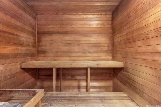 a view of a swimming pool with a lounge chairs