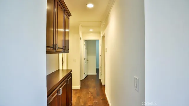 a view of hallway with livingroom