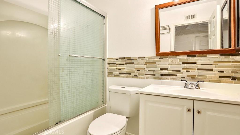 4862 Gainsport Circle Irvine, CA 92604 - Photo 14 of 24 a bathroom with a sink toilet and shower