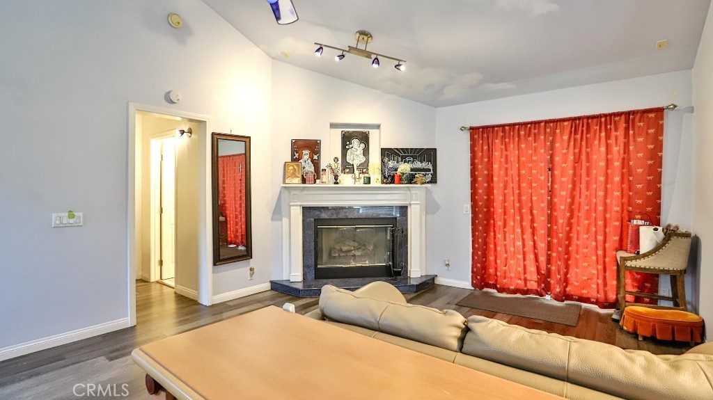 4862 Gainsport Circle Irvine, CA 92604 - Photo 20 of 24 a living room with furniture and a fireplace
