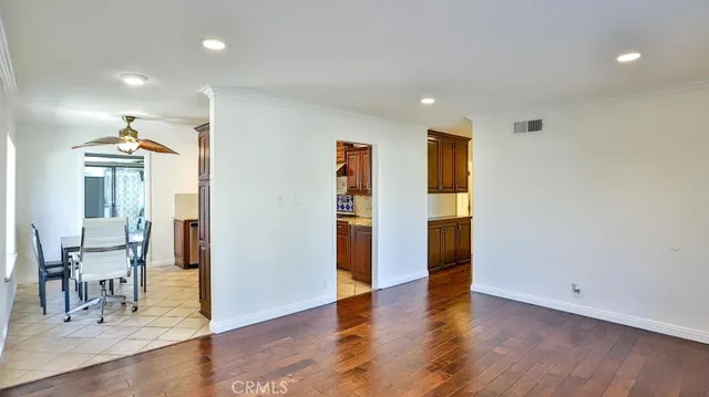 a view of a livingroom with furniture and wooden floor