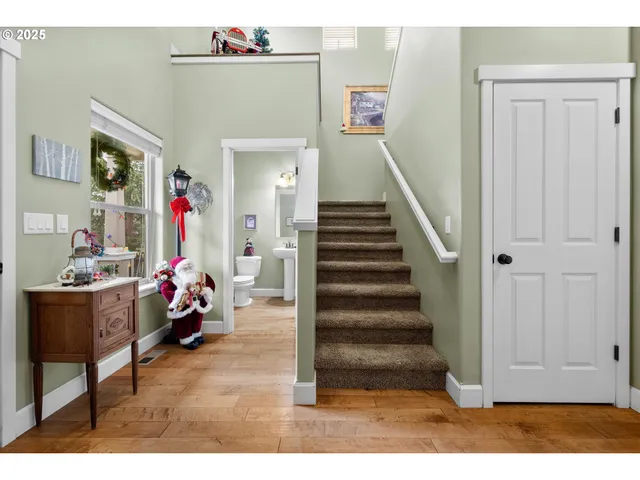 a bathroom with a sink toilet and a mirror