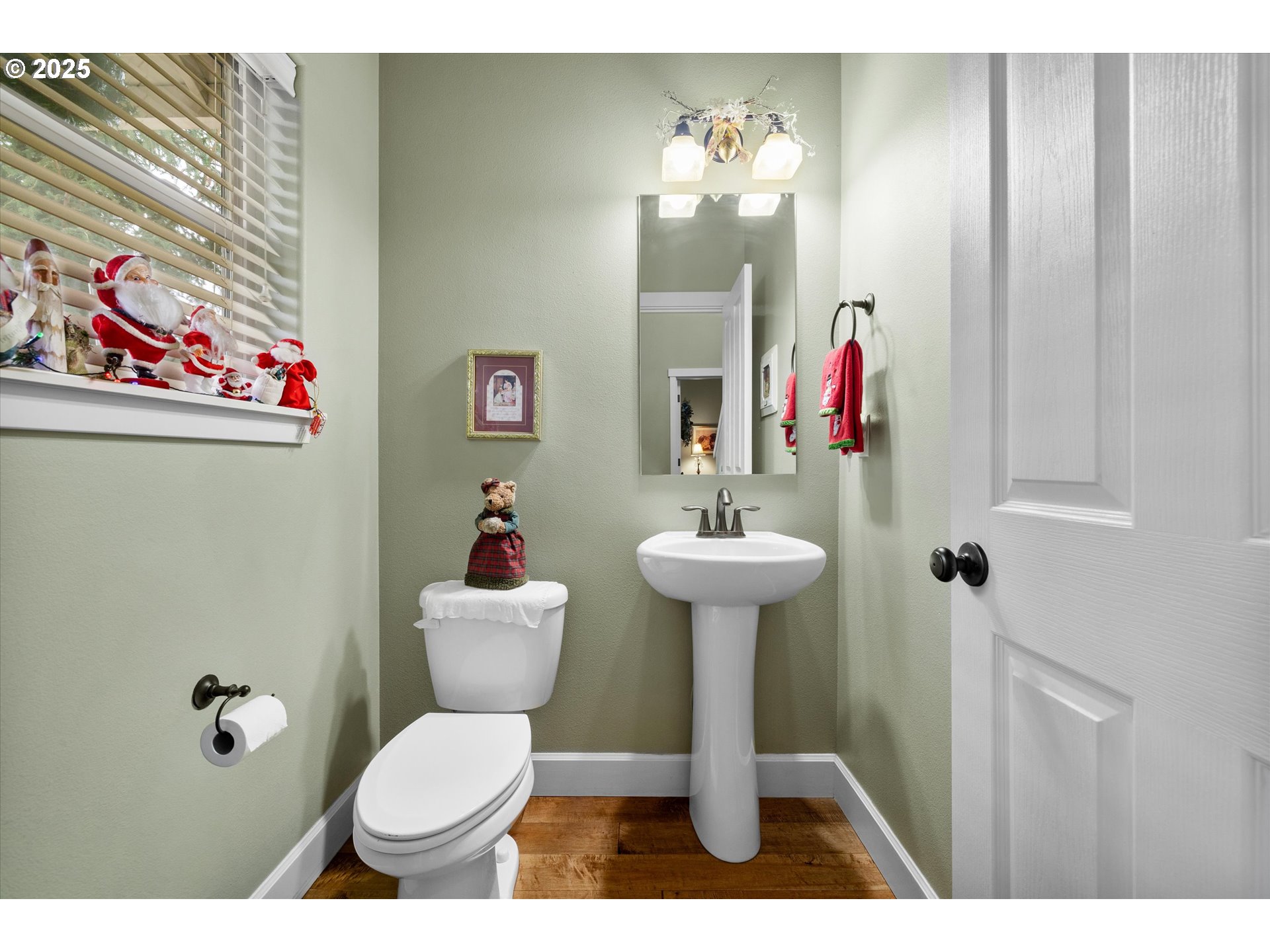 21281 Bellflower Place Bend, OR 97702 - Photo 20 of 48 a bathroom with a sink toilet and a mirror