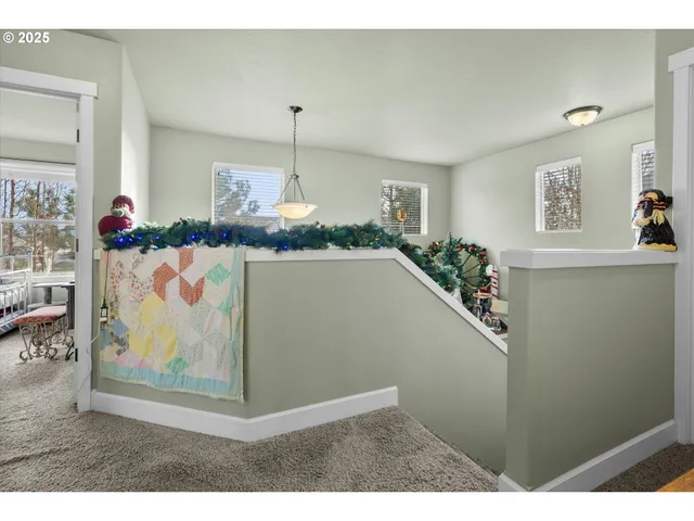 a bathroom with a sink mirror vanity and toilet