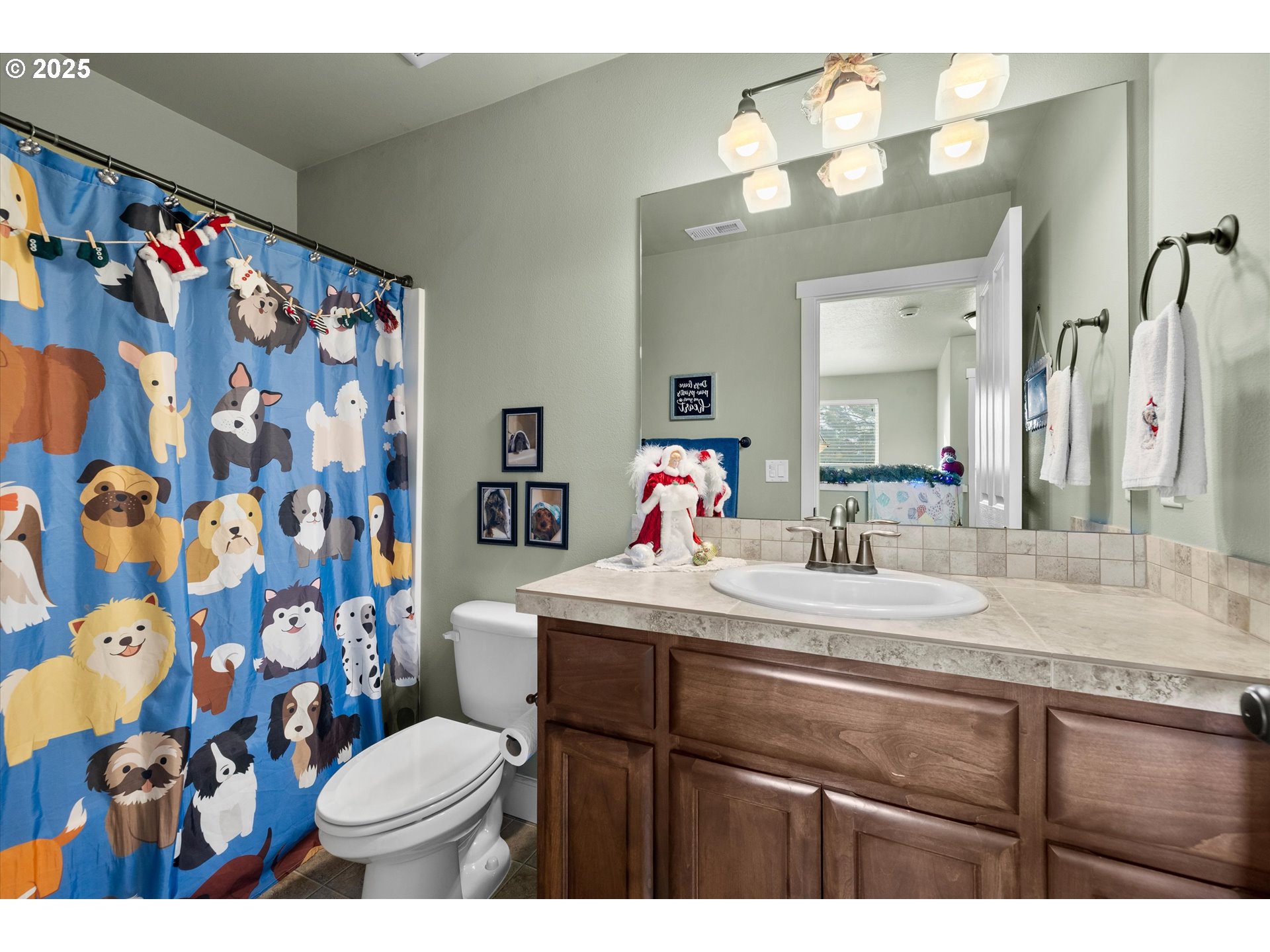 21281 Bellflower Place Bend, OR 97702 - Photo 22 of 48 a bathroom with a sink mirror vanity and toilet
