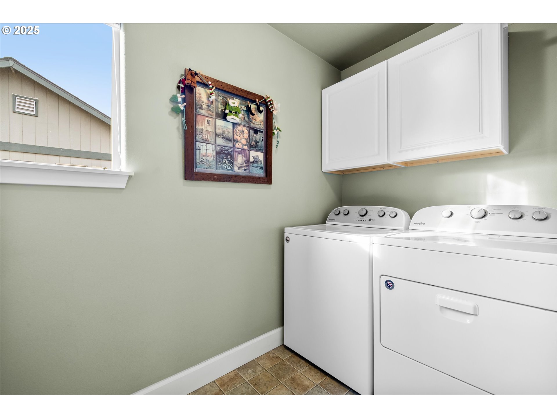 21281 Bellflower Place Bend, OR 97702 - Photo 23 of 48 a utility room with dryer and washer