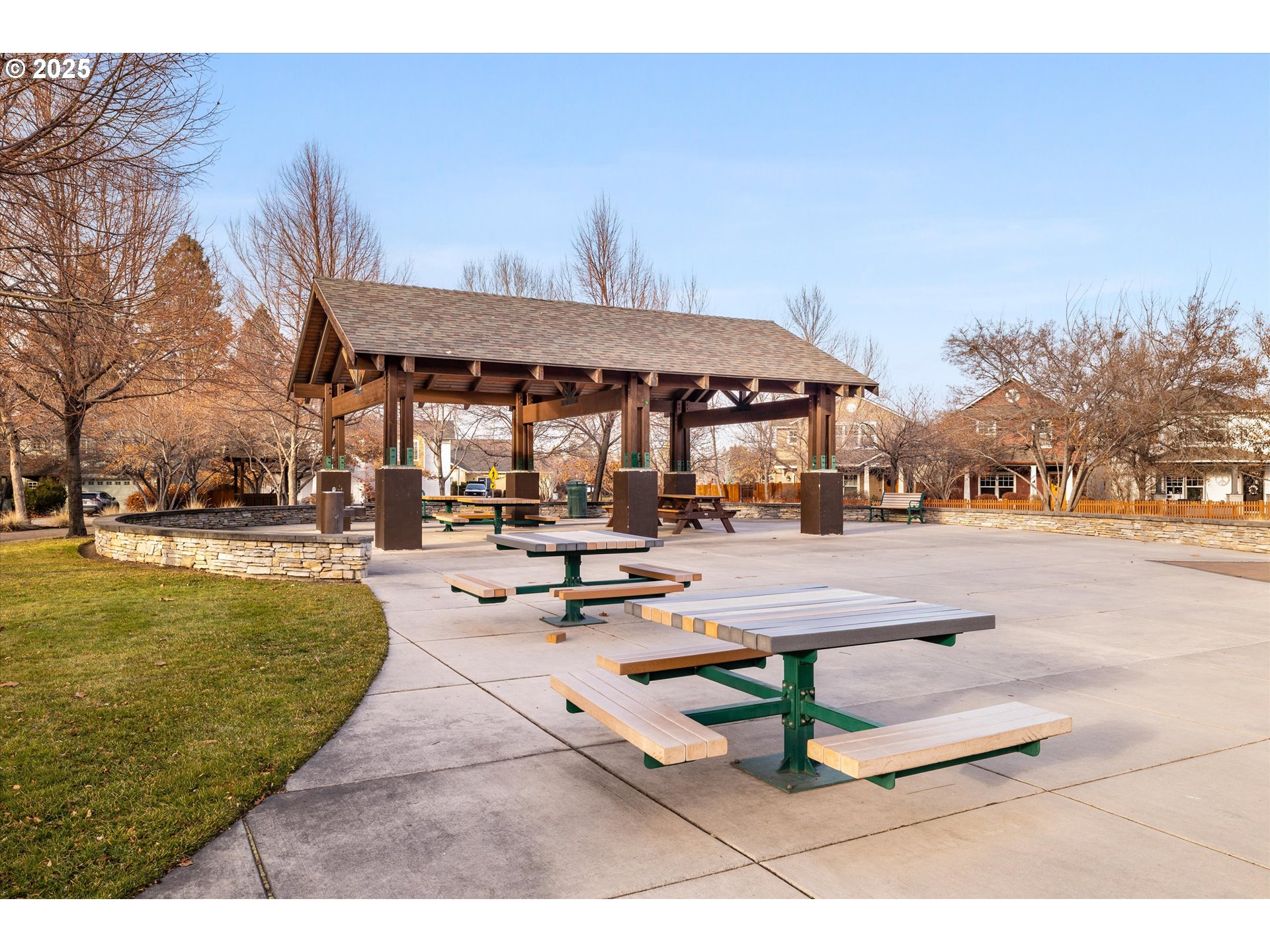 21281 Bellflower Place Bend, OR 97702 - Photo 48 of 48 a view of swimming pool with outdoor seating and trees in the background
