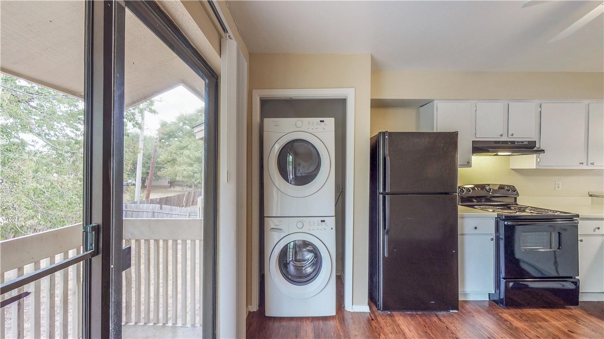 301 Manuel Drive, Unit C College Station, TX 77840 - Photo 21 of 25 a view of kitchen and washer and dryer