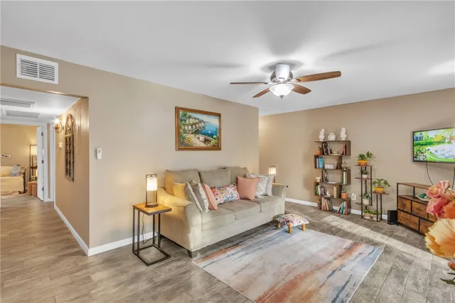 a bedroom with a bed and lamps