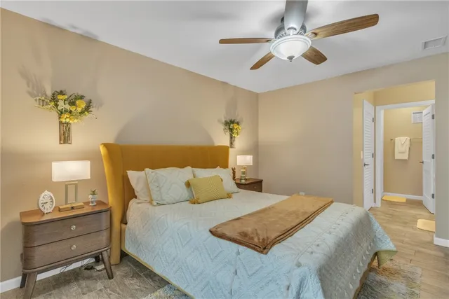 a bathroom with a sink vanity and a mirror