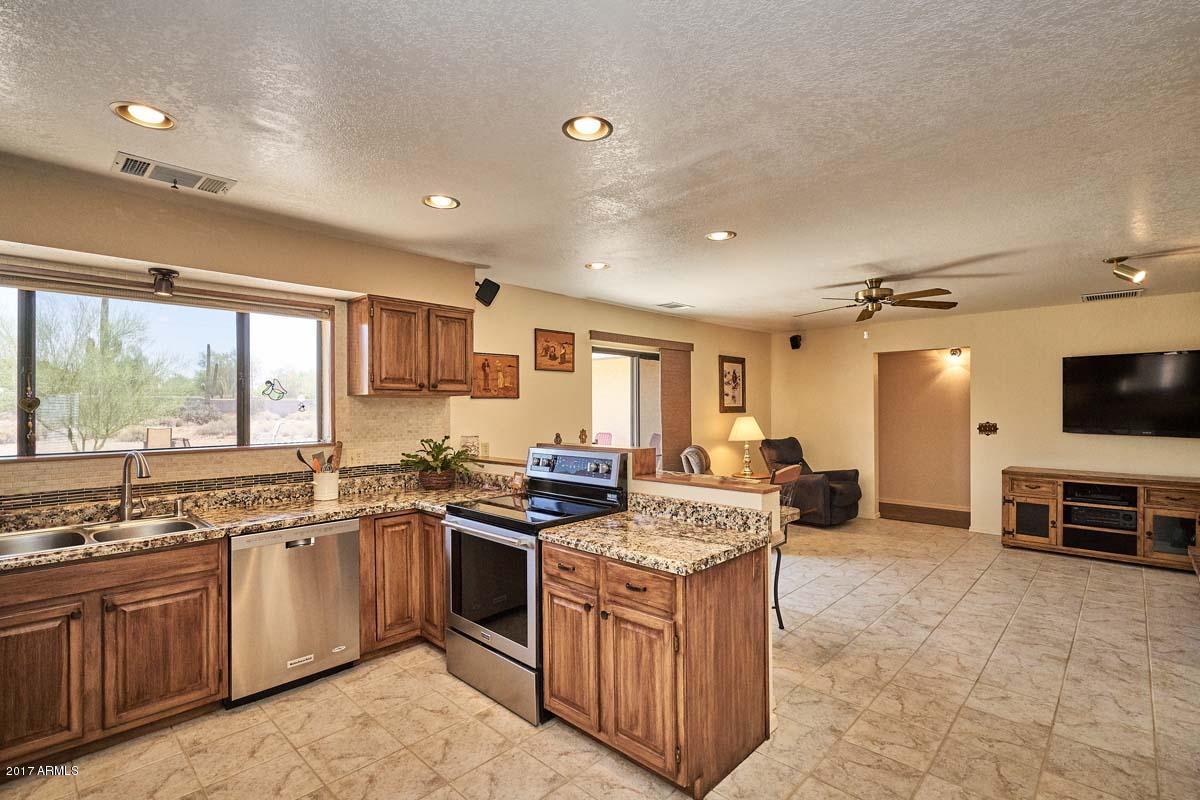 2209 South Sixshooter Road Apache Junction, AZ 85119 - Photo 14 of 49 Kitchen-Family Room