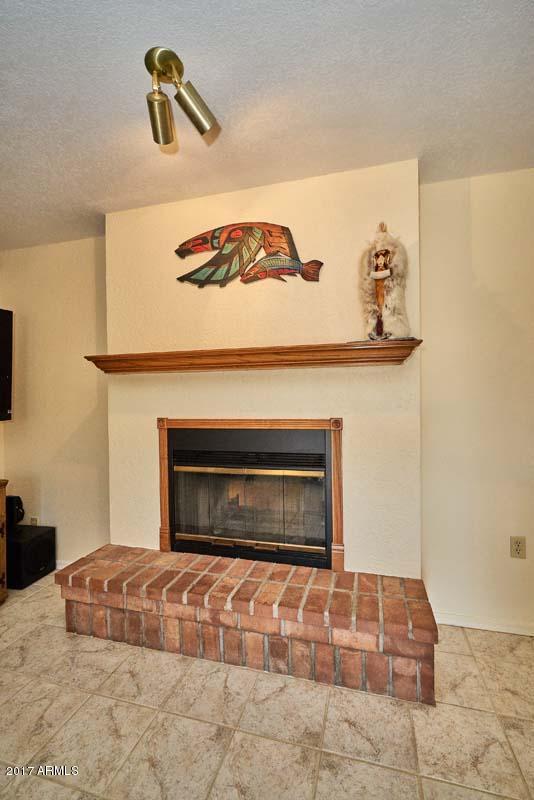 2209 South Sixshooter Road Apache Junction, AZ 85119 - Photo 21 of 49 Family Room-Fireplace