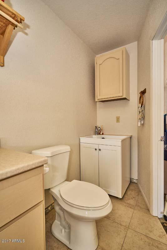 2209 South Sixshooter Road Apache Junction, AZ 85119 - Photo 37 of 49 Garage-Powder Room