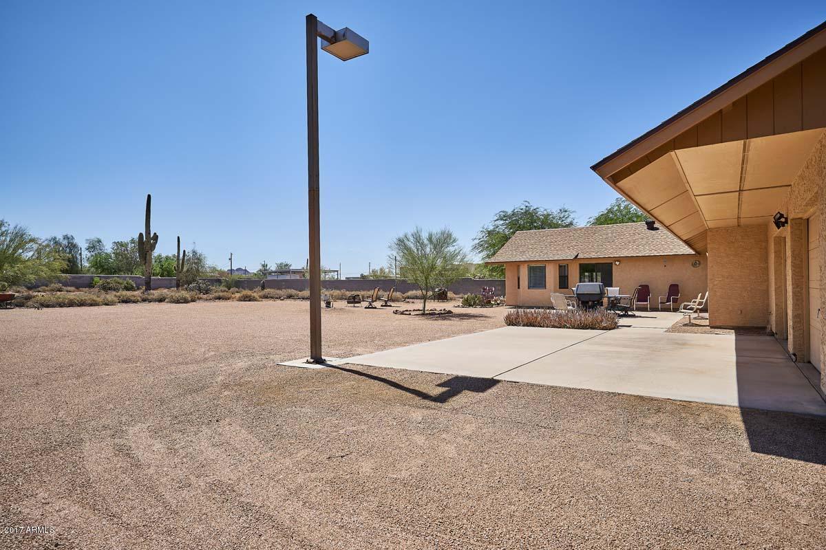 2209 South Sixshooter Road Apache Junction, AZ 85119 - Photo 42 of 49 Backyard-Extended Patio