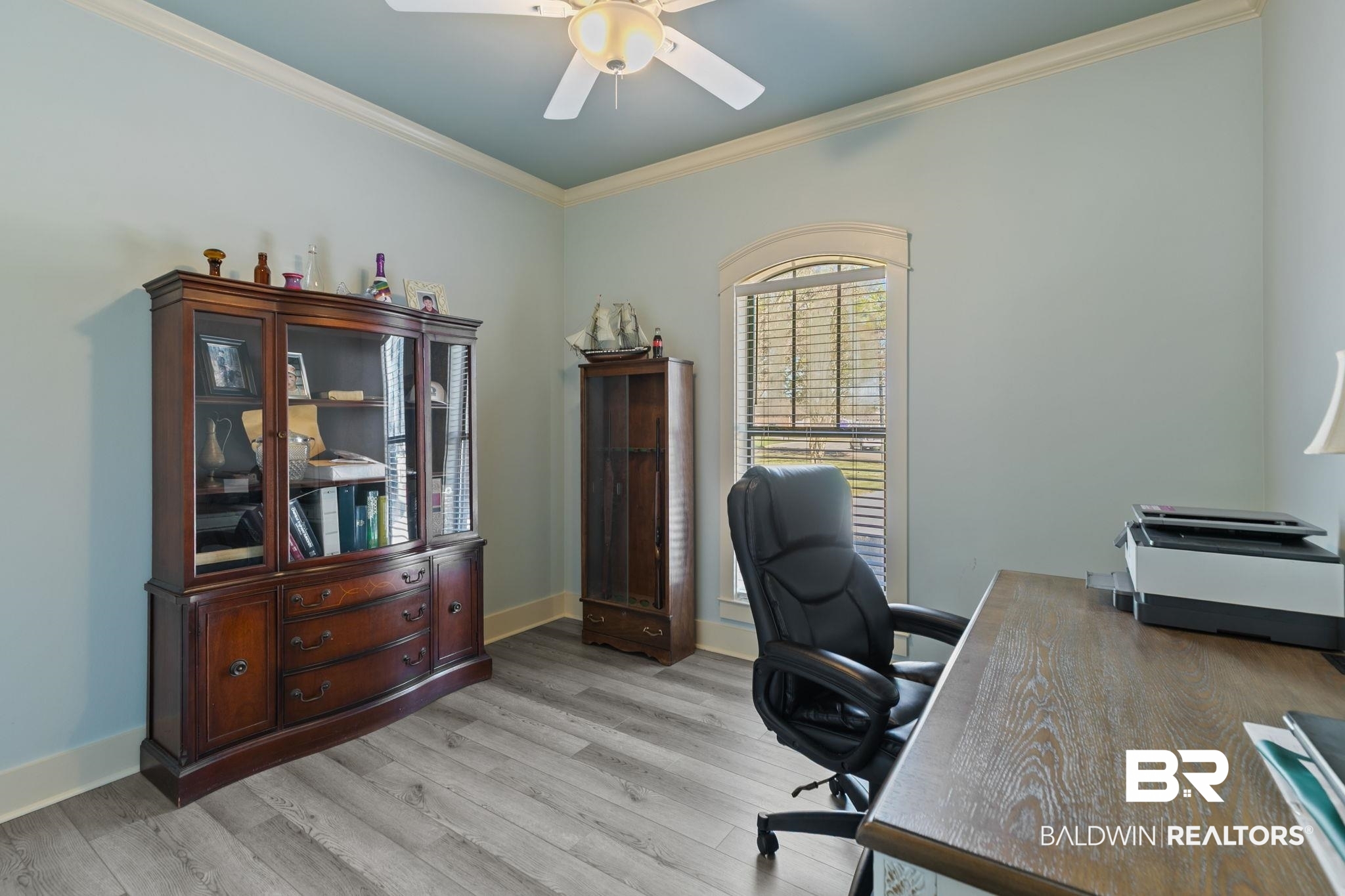9584 Sanibel Loop Daphne, AL 36526 - Photo 33 of 48 Home office featuring ornamental molding, light wood-style flooring, and a ceiling fan