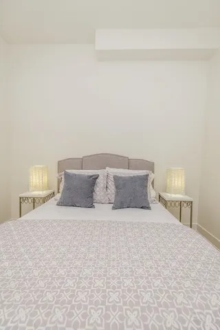 a bathroom with a sink toilet and mirror