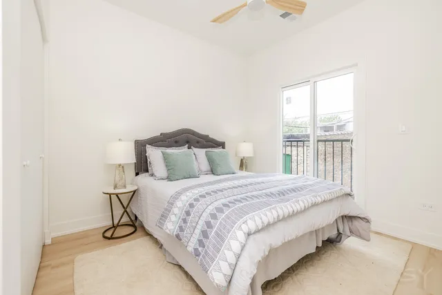 a bedroom with a bed and a closet