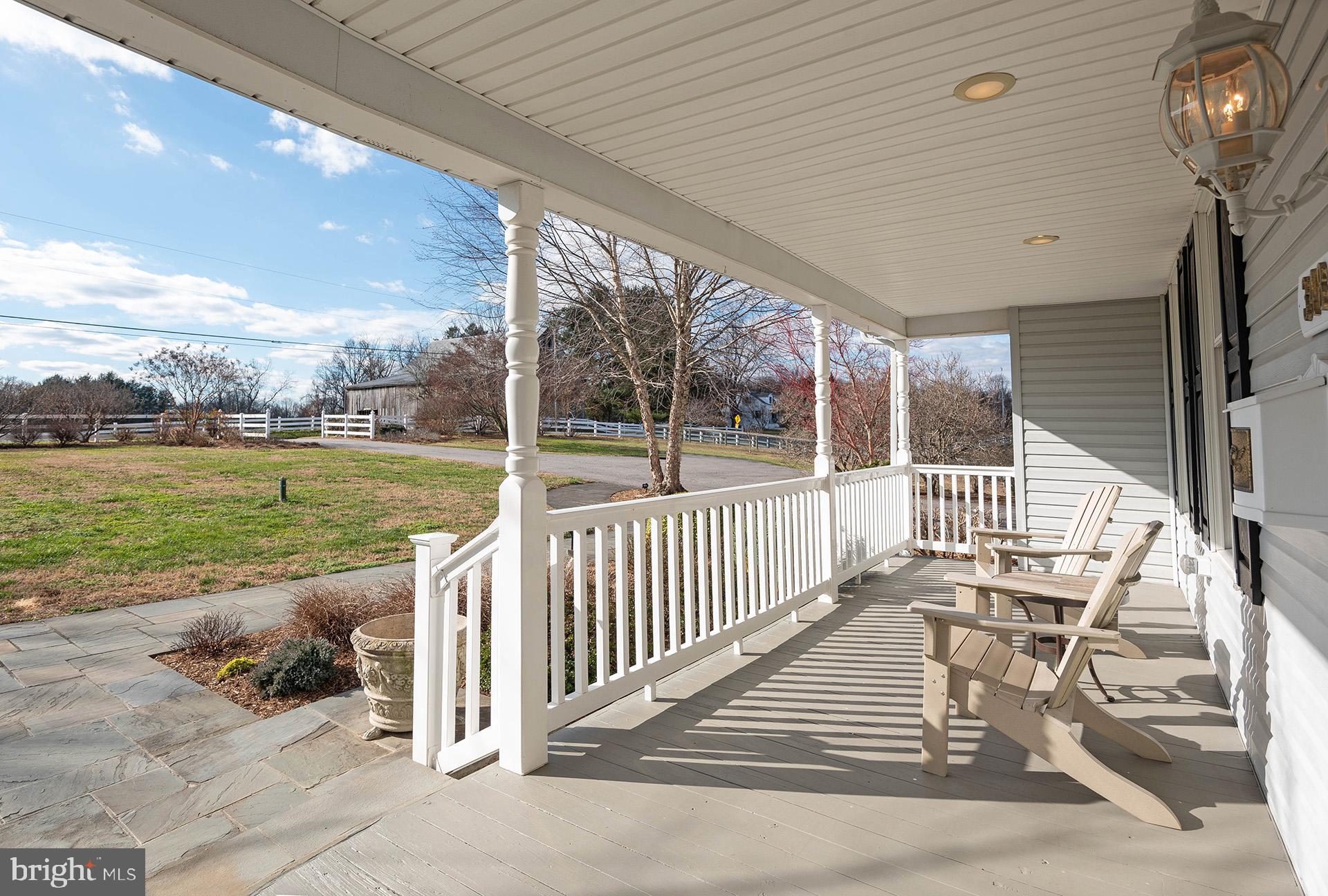 348 South River Clubhouse Road Edgewater, MD 21037 - Photo 12 of 74 Front of Wrap Around Porch