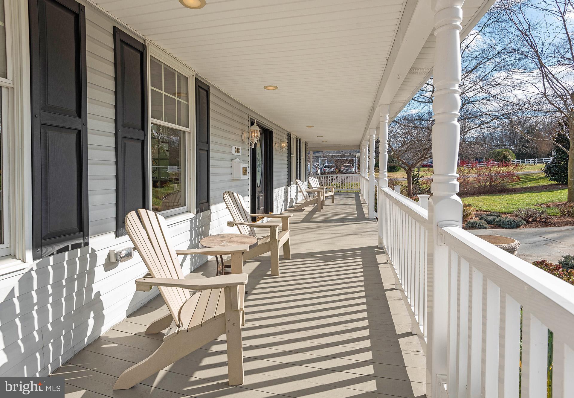 348 South River Clubhouse Road Edgewater, MD 21037 - Photo 13 of 74 Front of Wrap Around Porch