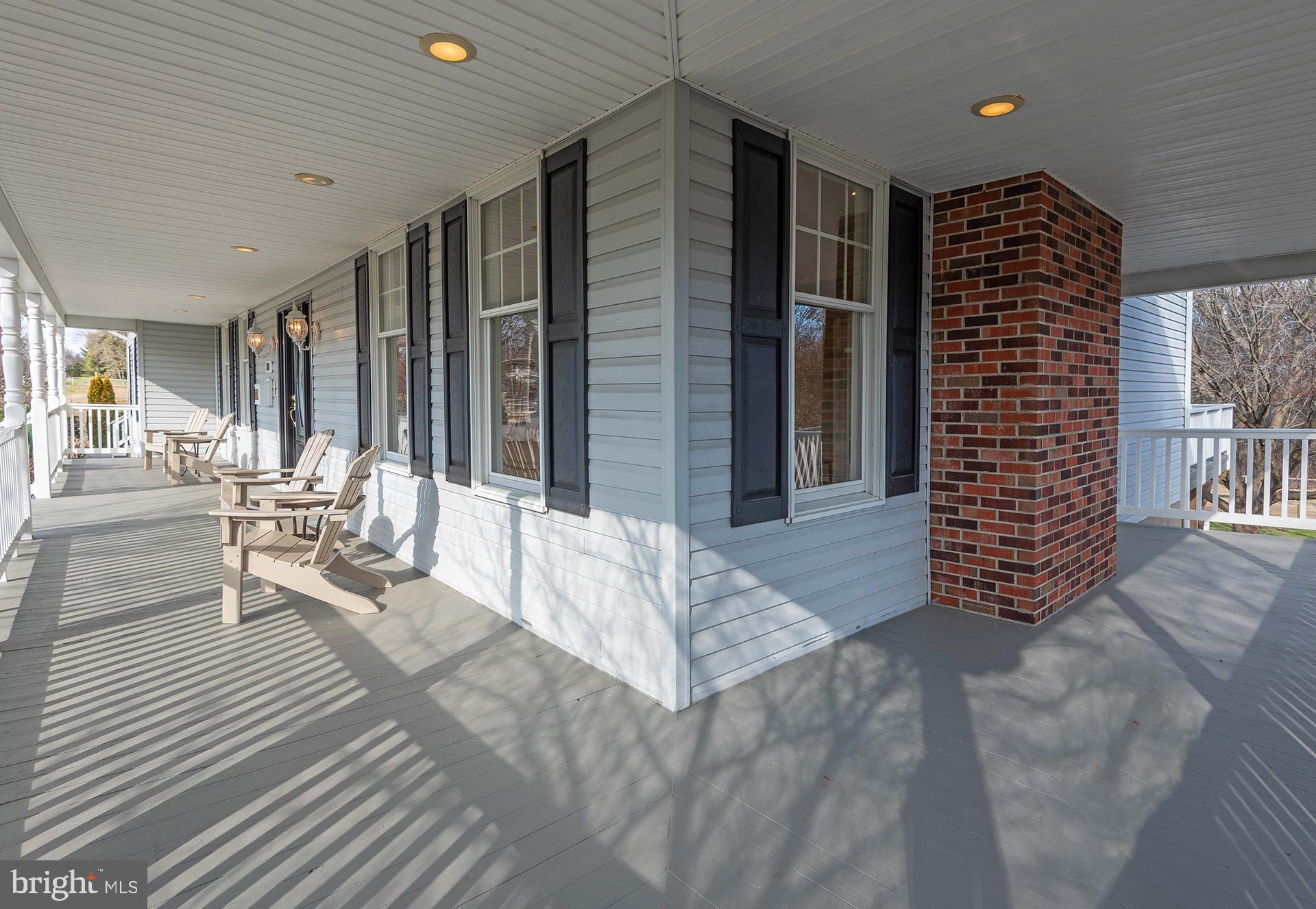 348 South River Clubhouse Road Edgewater, MD 21037 - Photo 14 of 74 Corner View of Wrap Around Porch