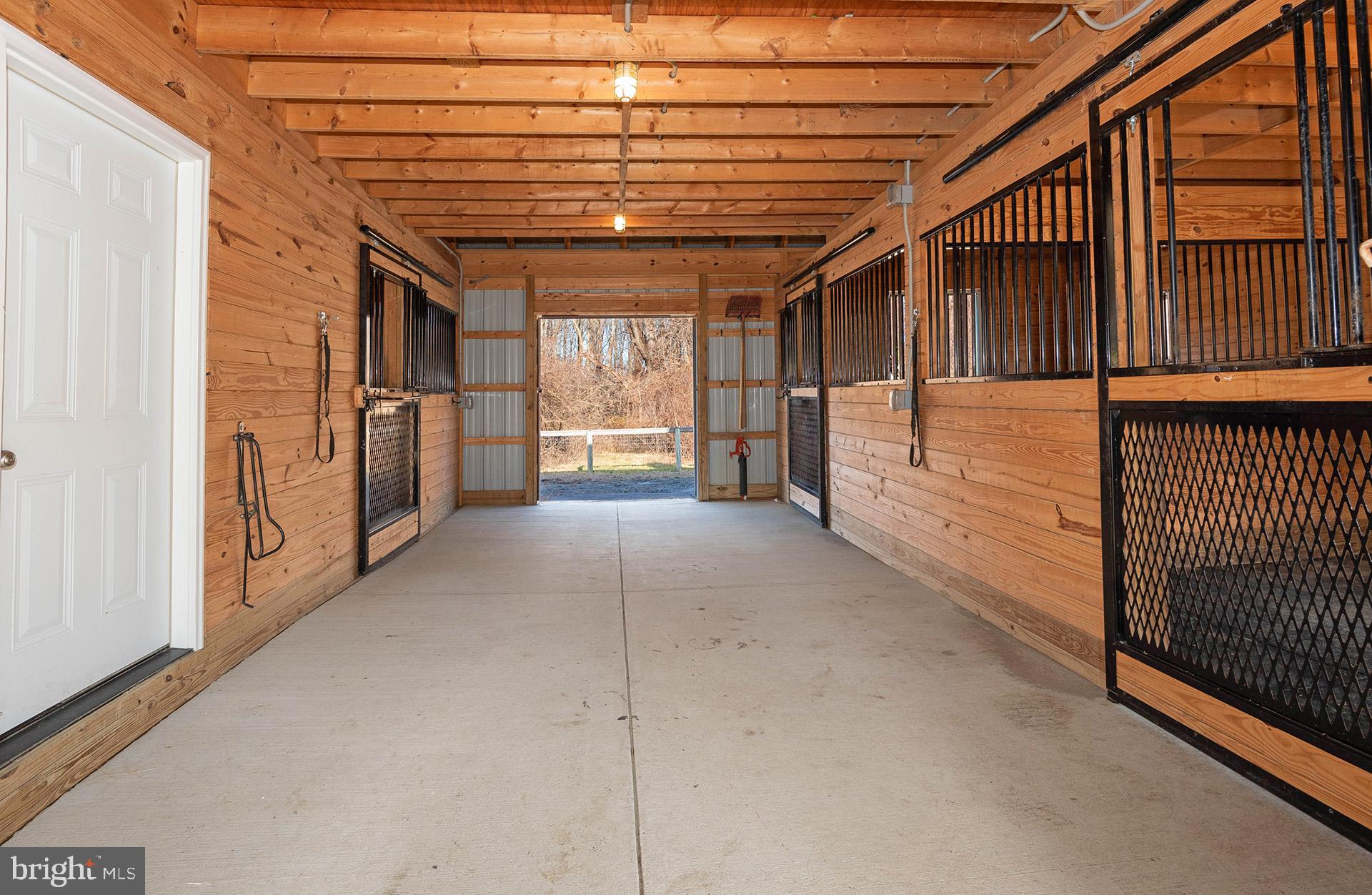 348 South River Clubhouse Road Edgewater, MD 21037 - Photo 63 of 74 Barn: Interior / Center Aisle
