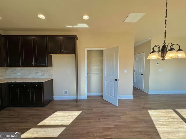 a view of a bathroom from the hallway