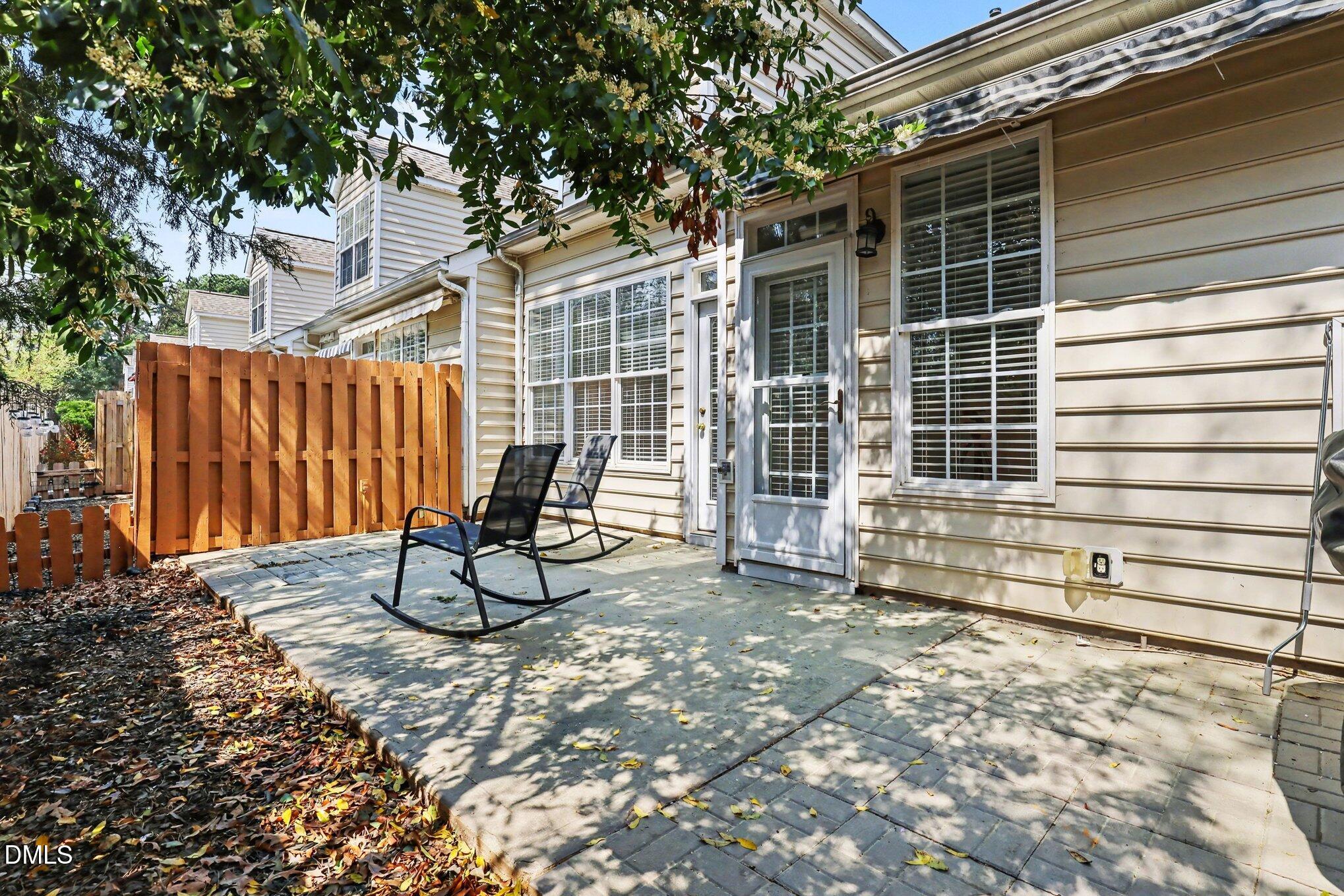 723 Swan Neck Lane Raleigh, NC 27615 - Photo 14 of 52 a view of a backyard with a bench