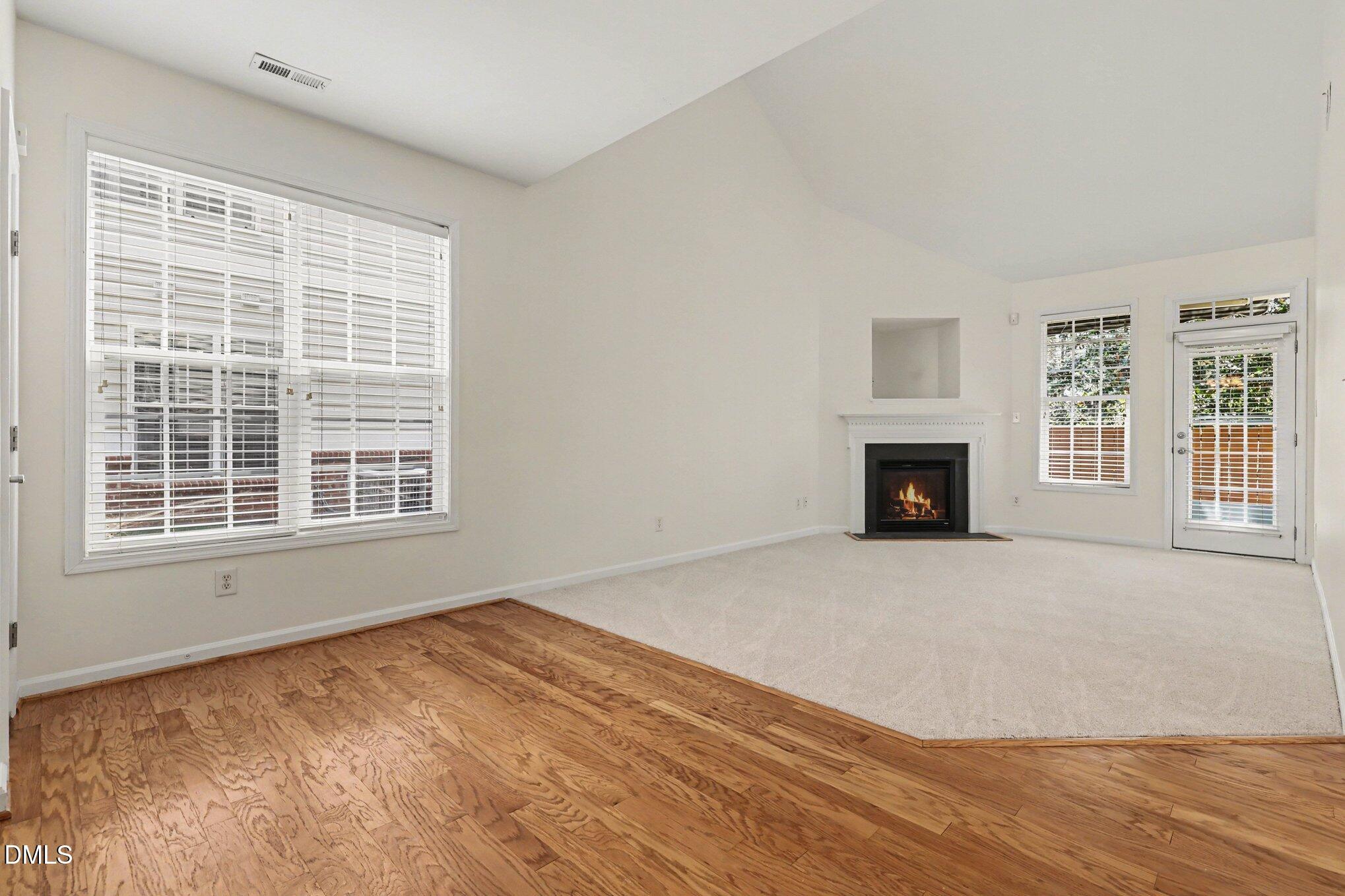 723 Swan Neck Lane Raleigh, NC 27615 - Photo 51 of 52 a view of empty room with a fireplace