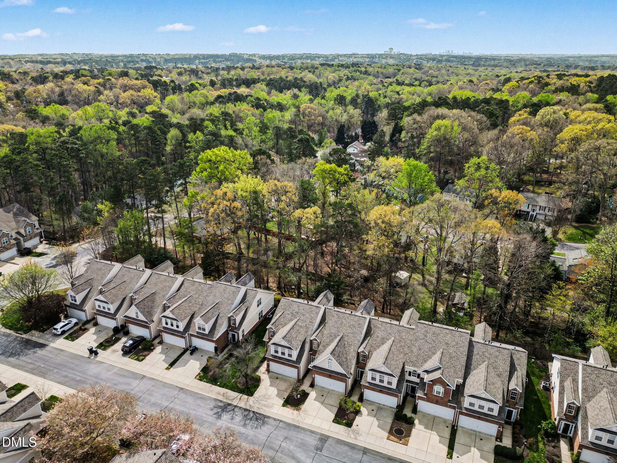723 Swan Neck Lane Raleigh, NC 27615 - Photo 36 of 52 a view of a yard with an outdoor seating