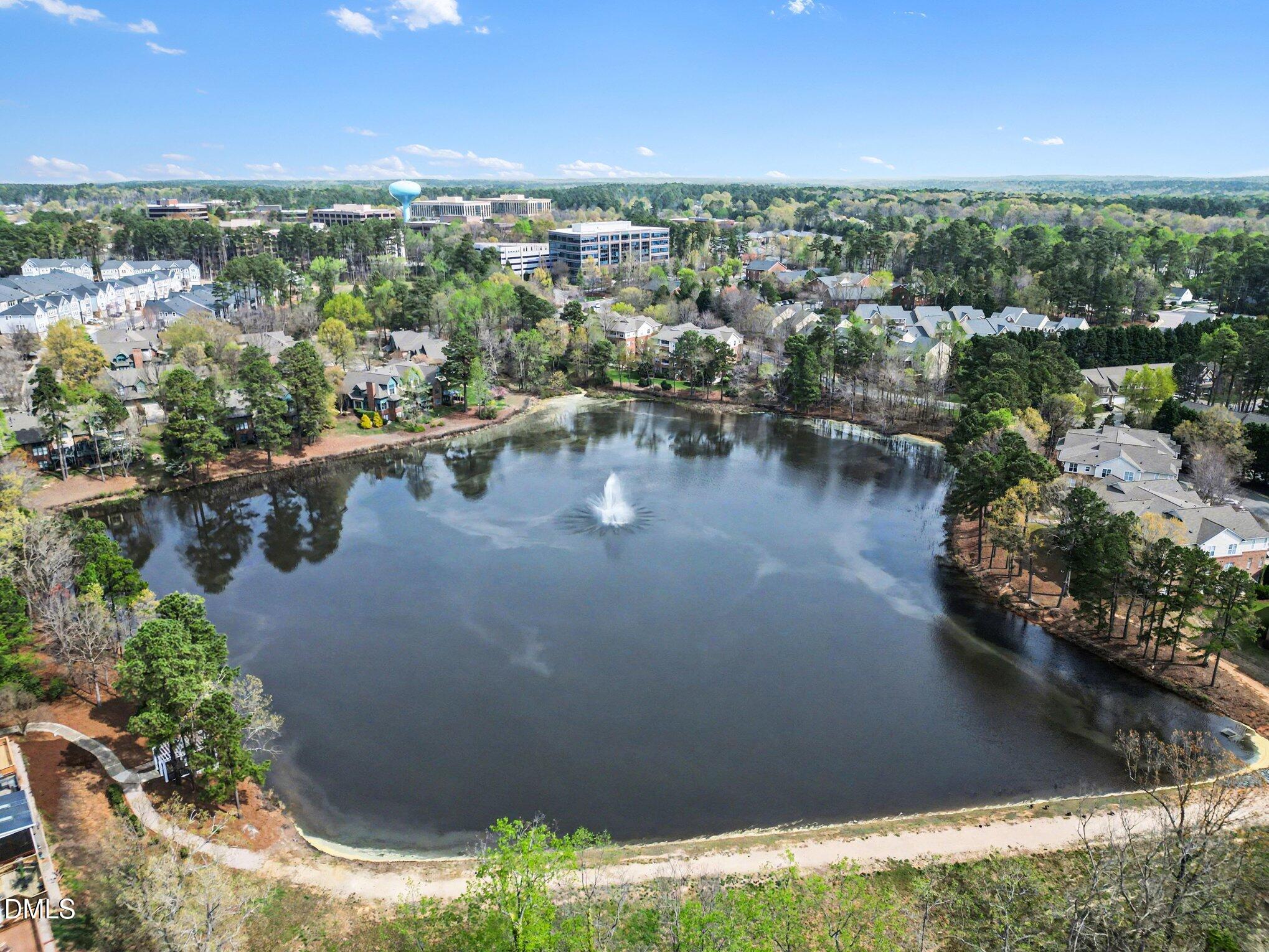 723 Swan Neck Lane Raleigh, NC 27615 - Photo 40 of 52 a view of a lake with houses