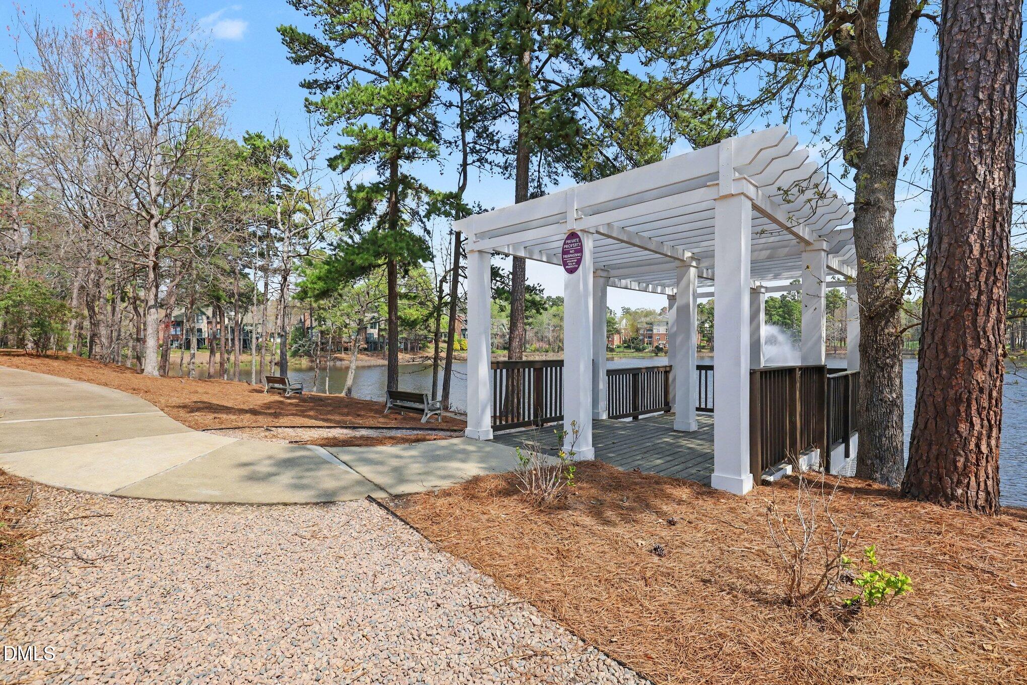 723 Swan Neck Lane Raleigh, NC 27615 - Photo 43 of 52 a view of a house with a tree in front of it