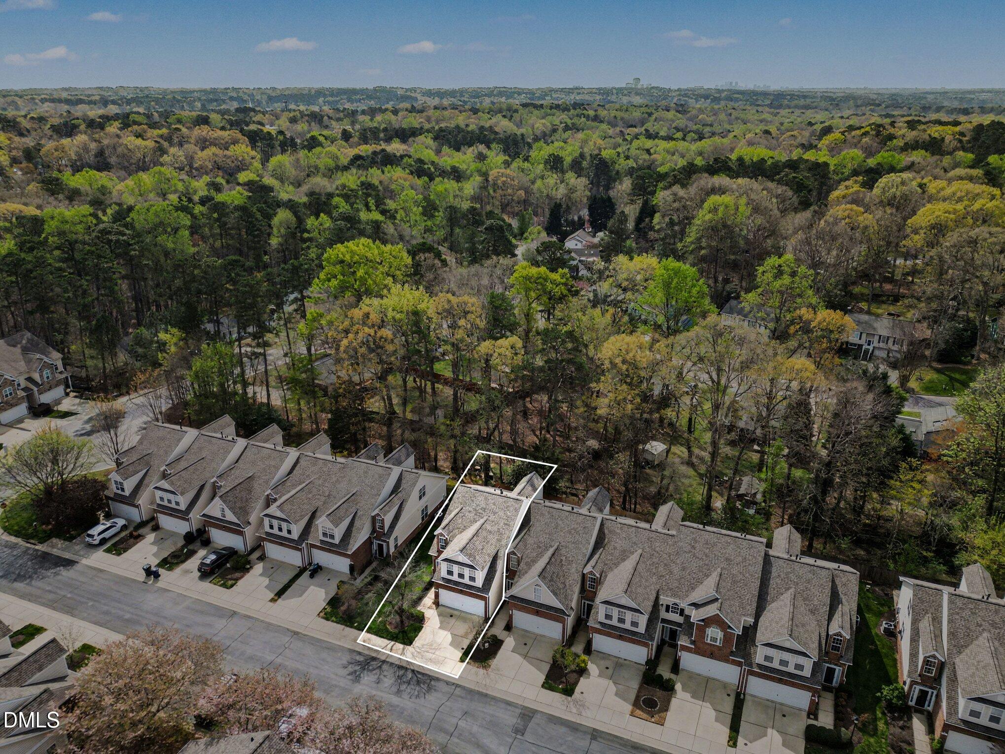 723 Swan Neck Lane Raleigh, NC 27615 - Photo 44 of 52 an aerial view of a house with a yard