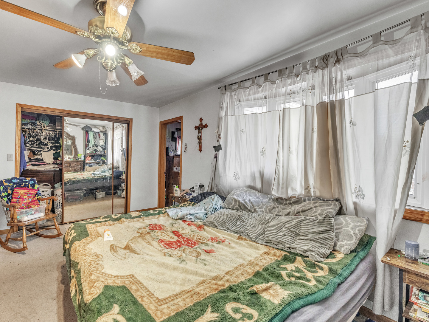 29153 South Klemme Road Beecher, IL 60401 - Photo 8 of 54 a bedroom with a bed and a chandelier