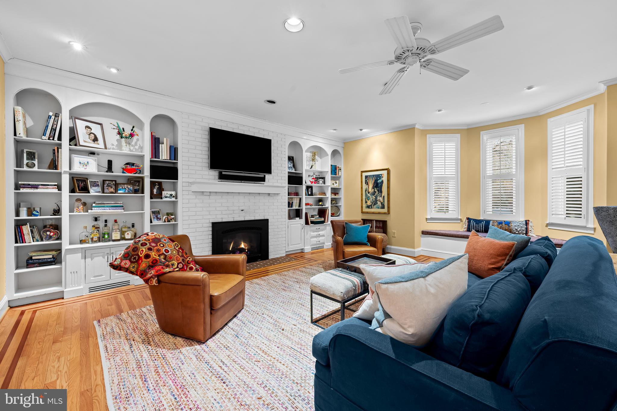 8412 Stevenson Road Baltimore, MD 21208 - Photo 20 of 77 a living room with furniture fireplace and flat screen tv